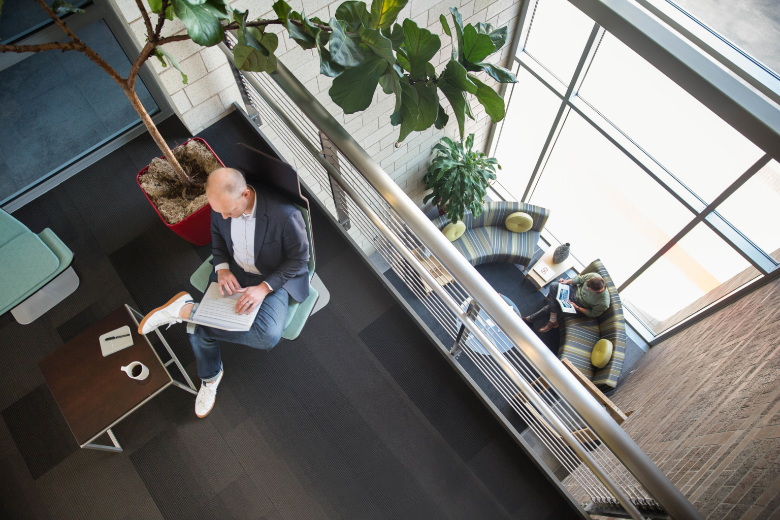 view of a mezzanine with hanging plants