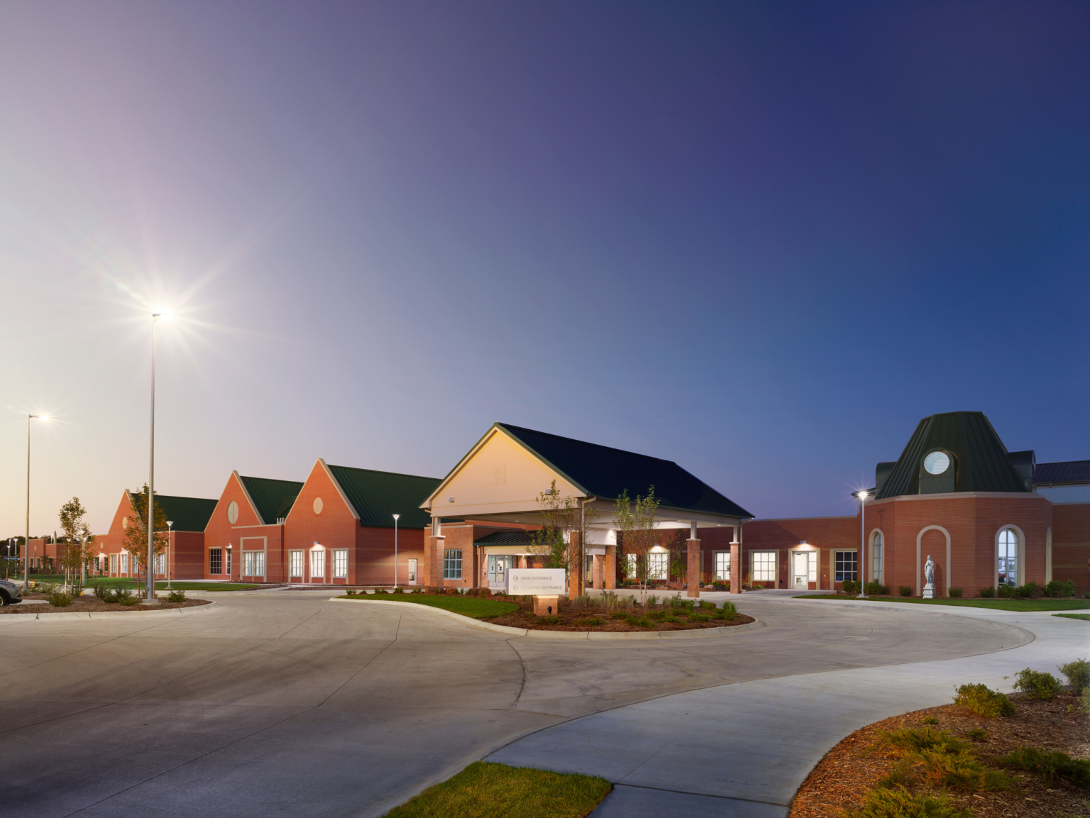 Madonna Rehabilitation Hospital exterior entrance at night