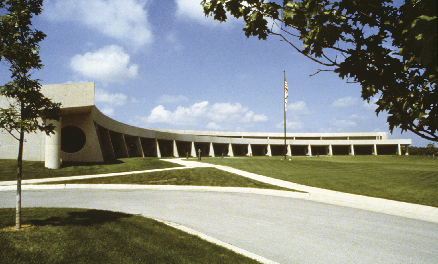 concrete building with a long driveway concrete building with a long driveway