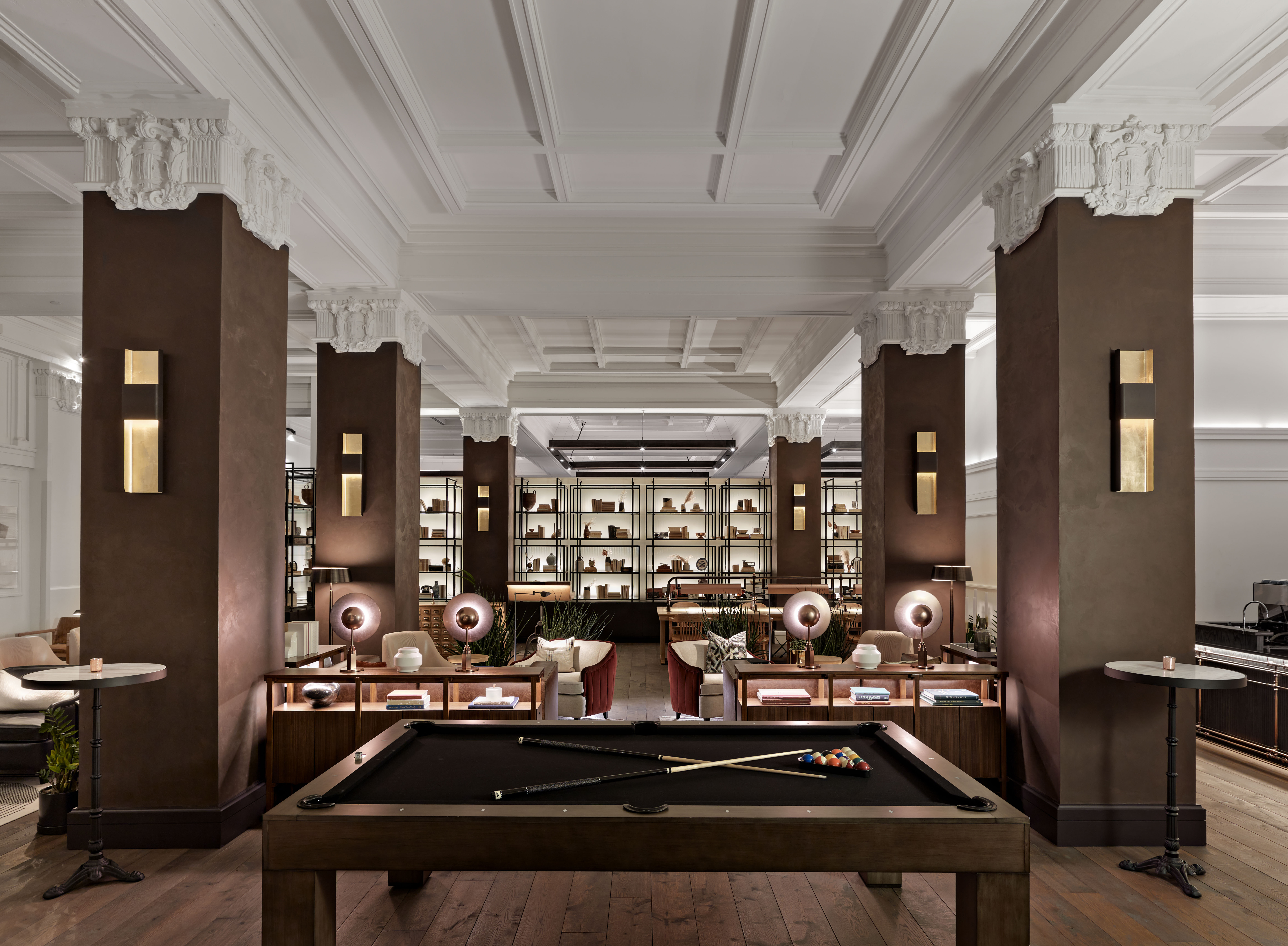 a hotel lobby with billiard tables and Corinthian columns a hotel lobby with billiard tables and Corinthian columns