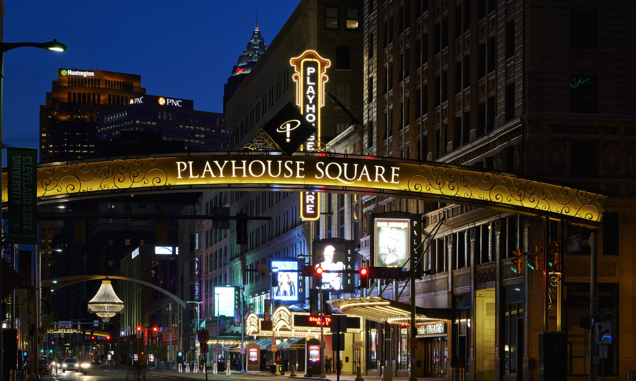 the center street through playhouse square illuminated at night