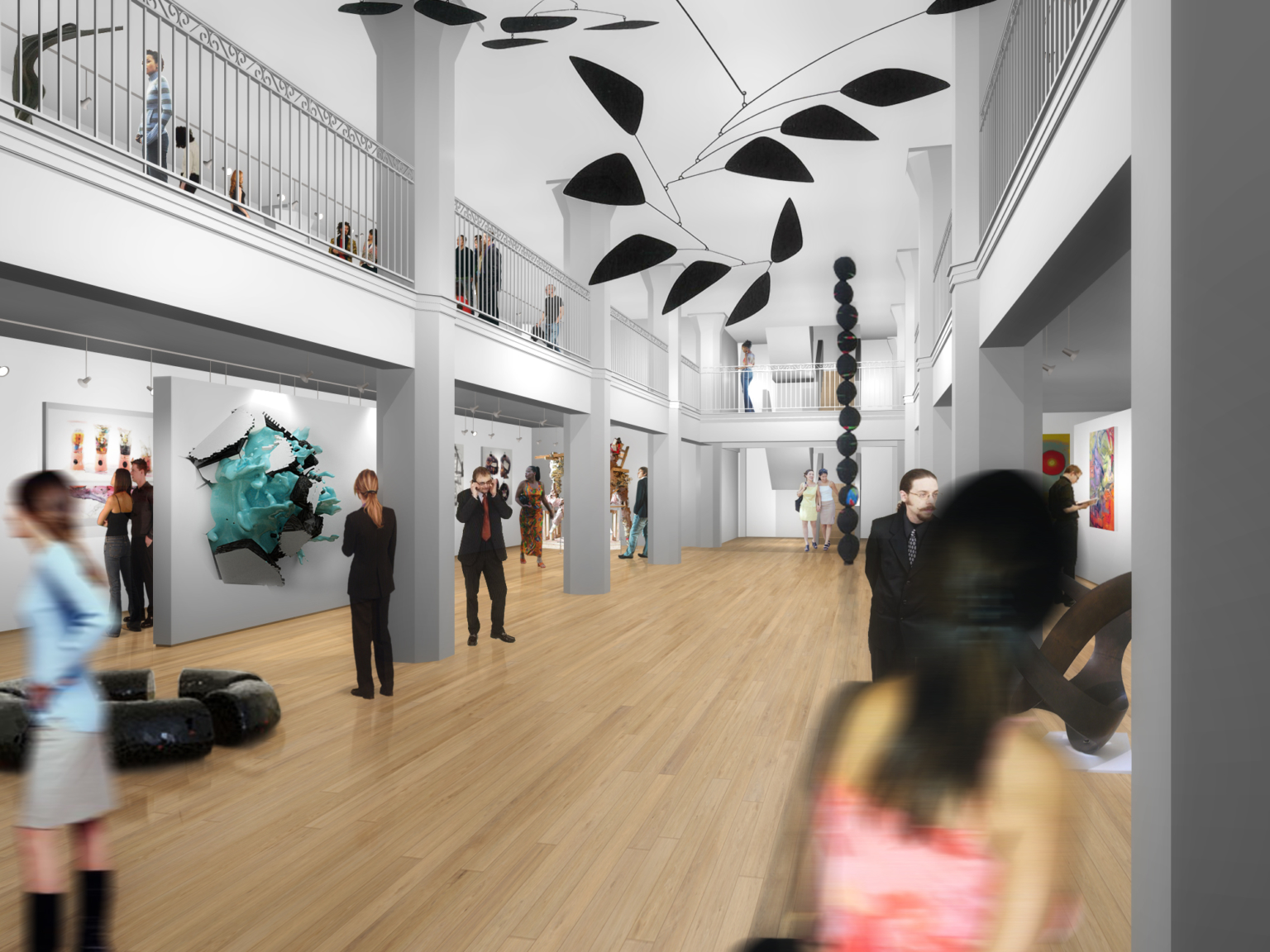 a bright art gallery with white walls and a wood floor