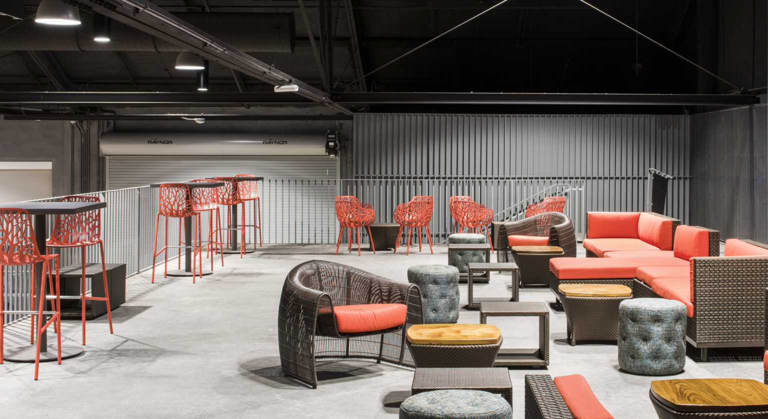 red lounge seating on a mezzanine