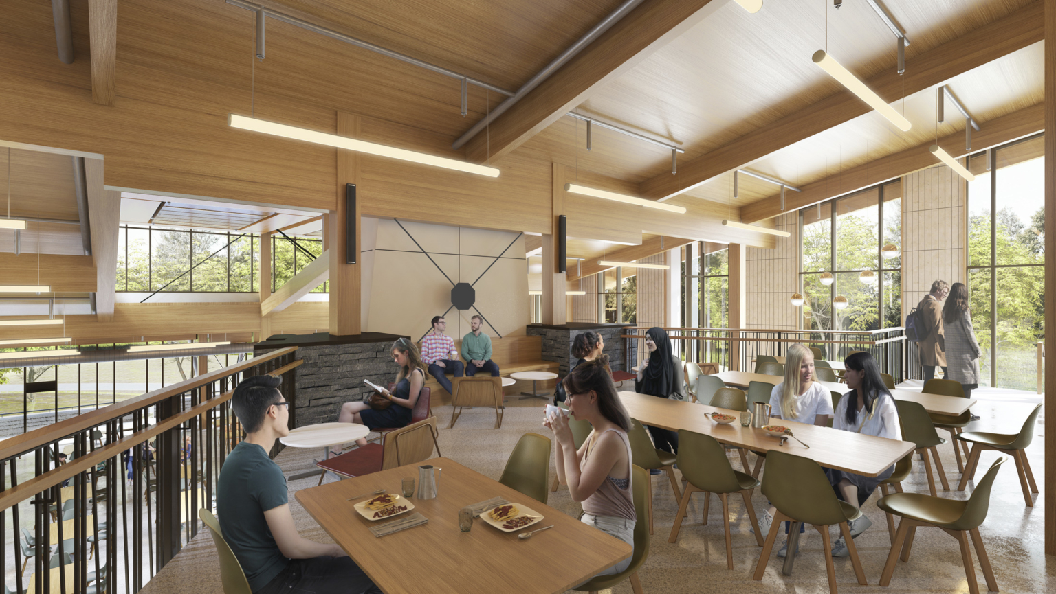 Upper dining area with stone accent wall, wood ceilings, and beams. There is a black iron railing overlooking the main floor dining area at Swarthmore College Dining and Community Commons. Upper dining area with stone accent wall, wood ceilings, and beams. There is a black iron railing overlooking the main floor dining area at Swarthmore College Dining and Community Commons.