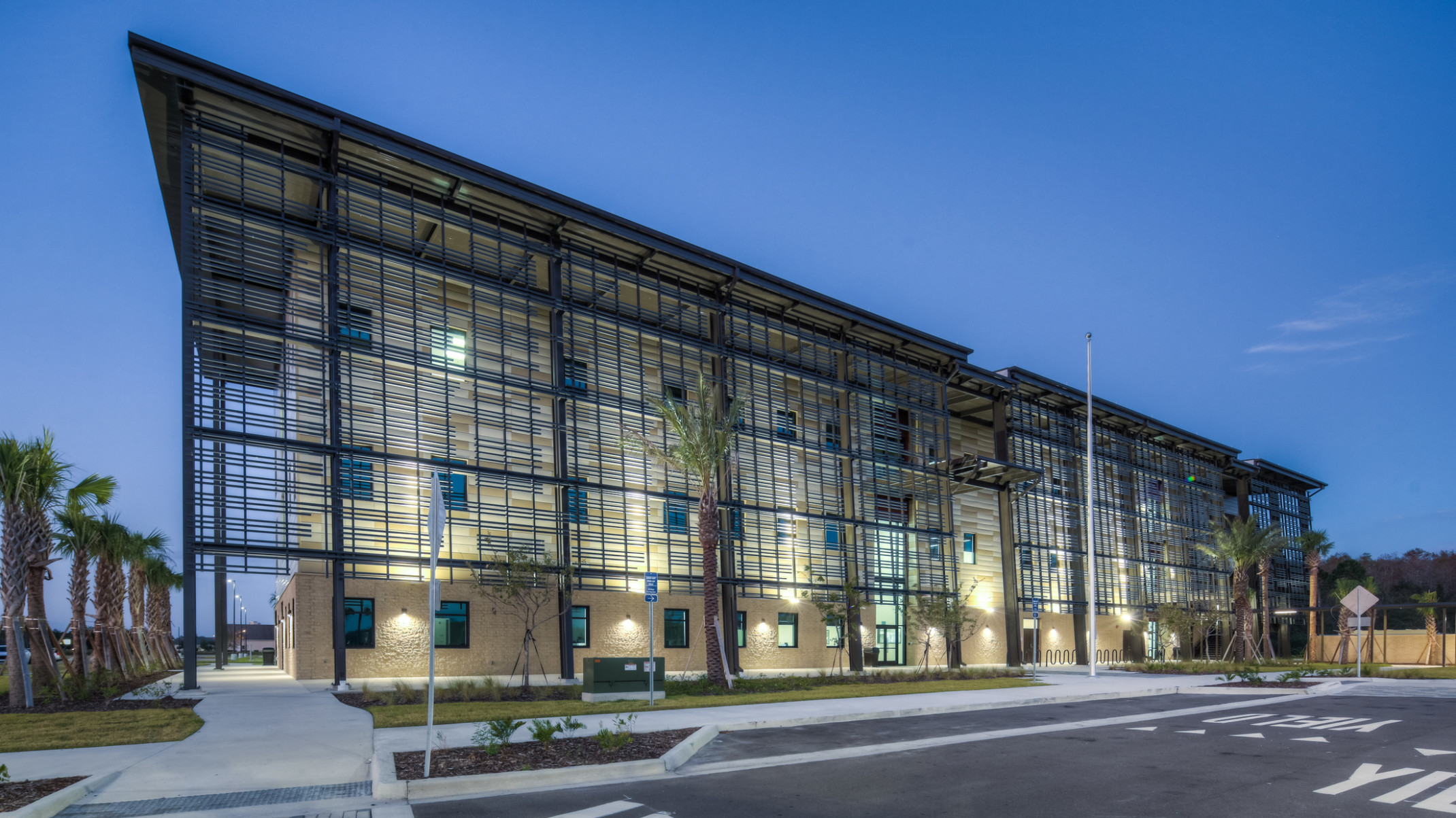 the exterior of Valencia College illuminated at dusk