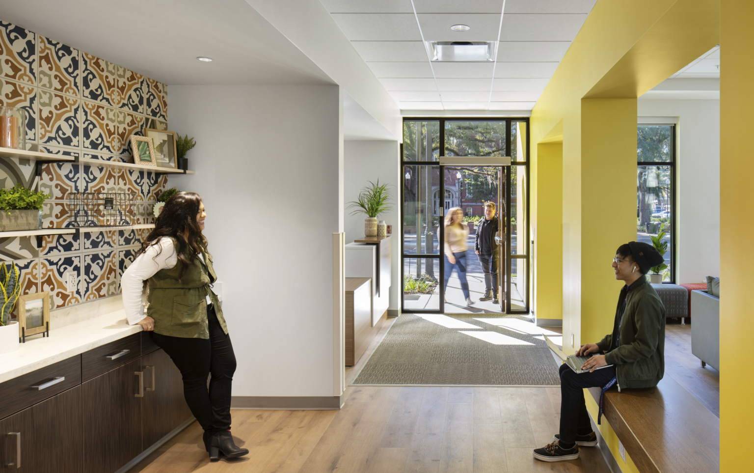 kitchenette area with spanish tile work and yellow walls incorporating culture into design at the university of florida la casita kitchenette area with spanish tile work and yellow walls incorporating culture into design at the university of florida la casita
