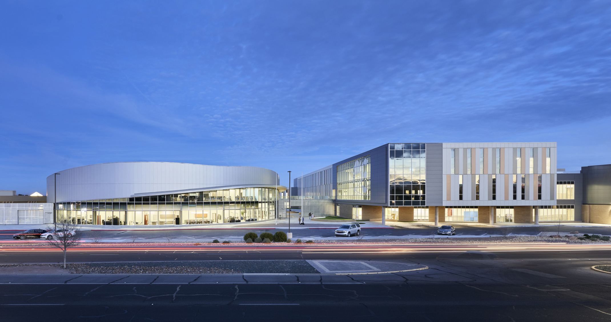 Evening view of curved building and addition at Eastwood High School. Evening view of curved building and addition at Eastwood High School.