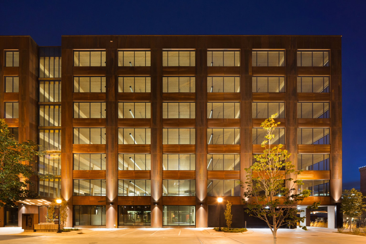 mass timber mid rise tower in minneapolis illuminated at night