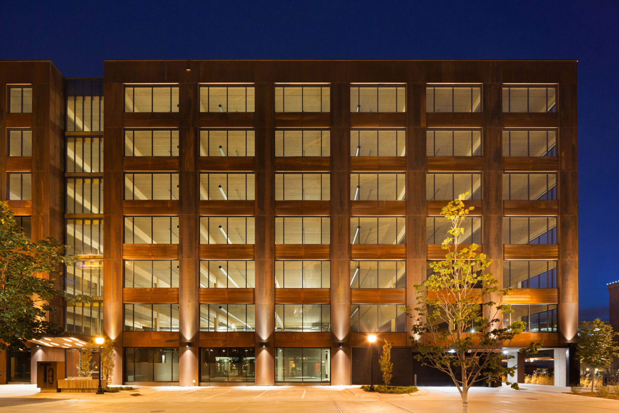 mass timber mid rise tower in minneapolis illuminated at night