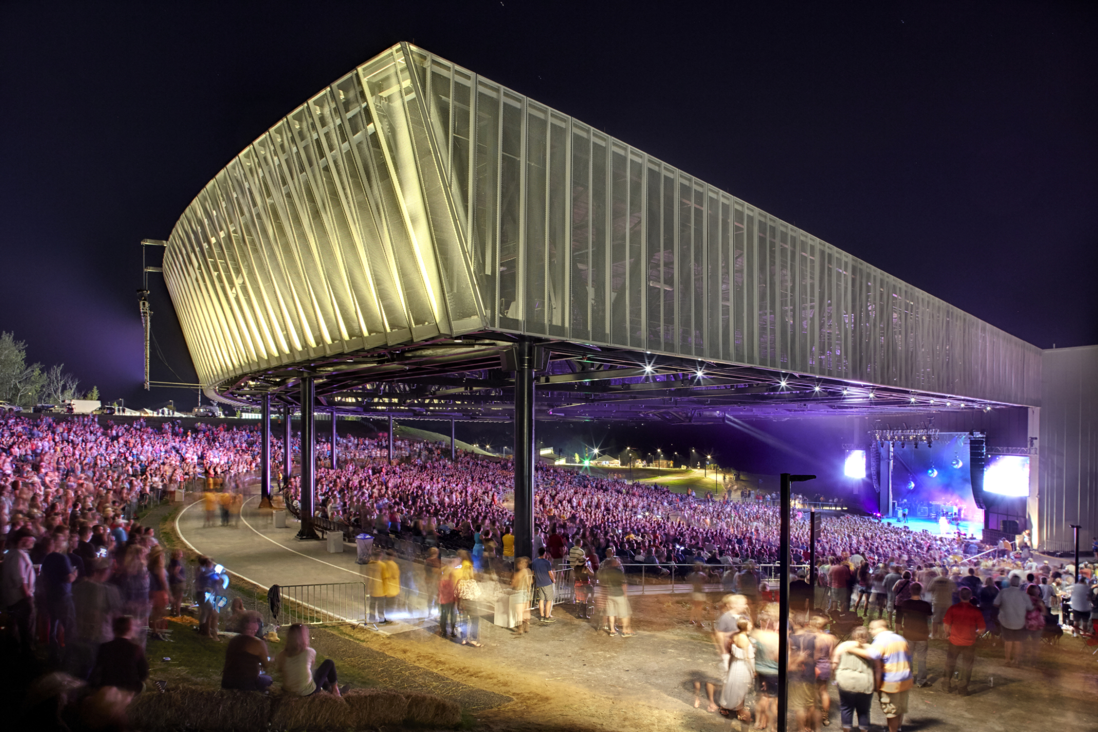 outdoor amphitheater illuminated at night