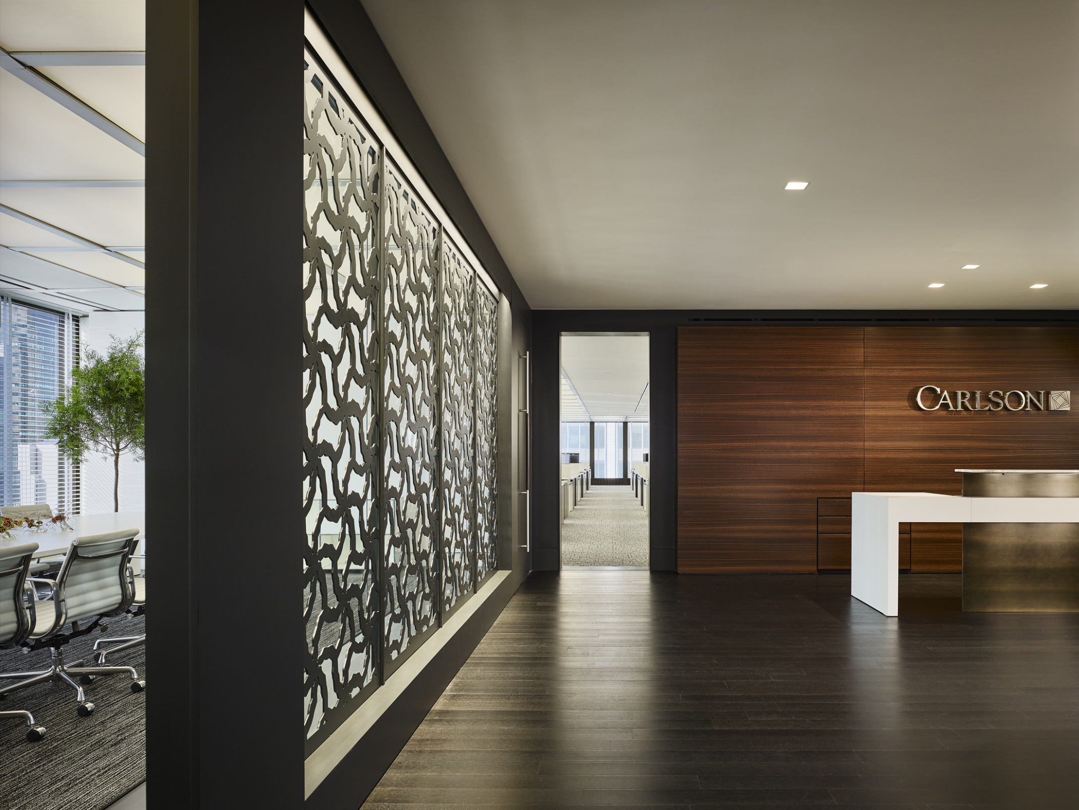 Front desk with sculpture wall at Carlson Capital NYC.