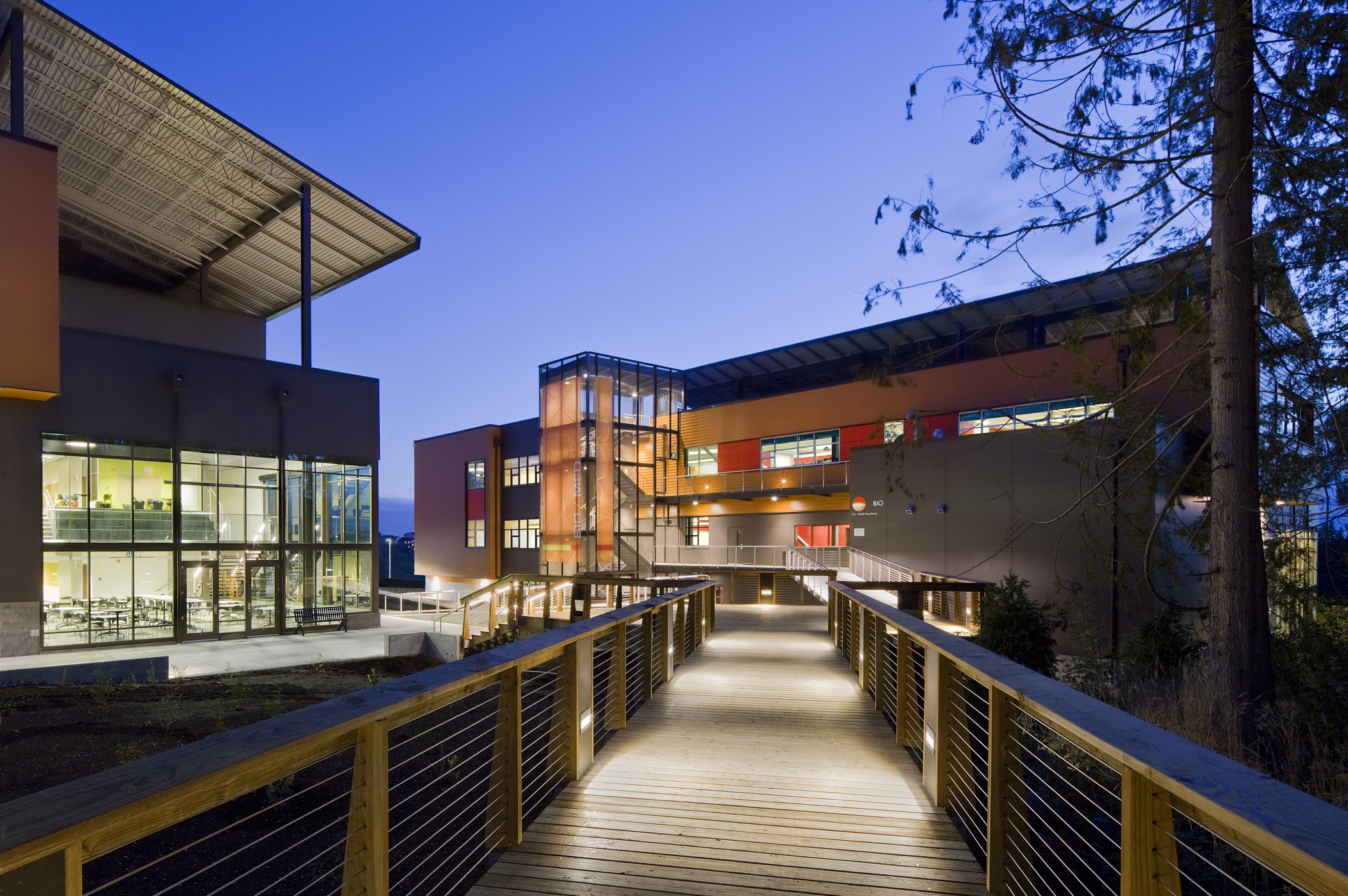 Evening stroll on outdoor wood bridge connecting the campus at Marysville Getchell High School. Evening stroll on outdoor wood bridge connecting the campus at Marysville Getchell High School.