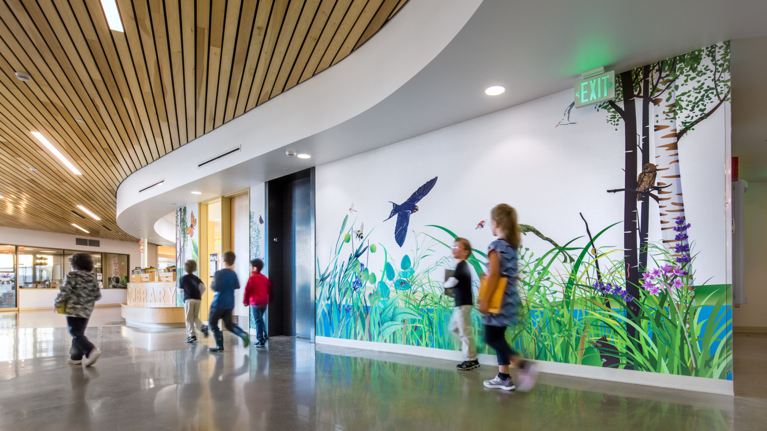 hallway with nature mural in a kindergarten center hallway with nature mural in a kindergarten center