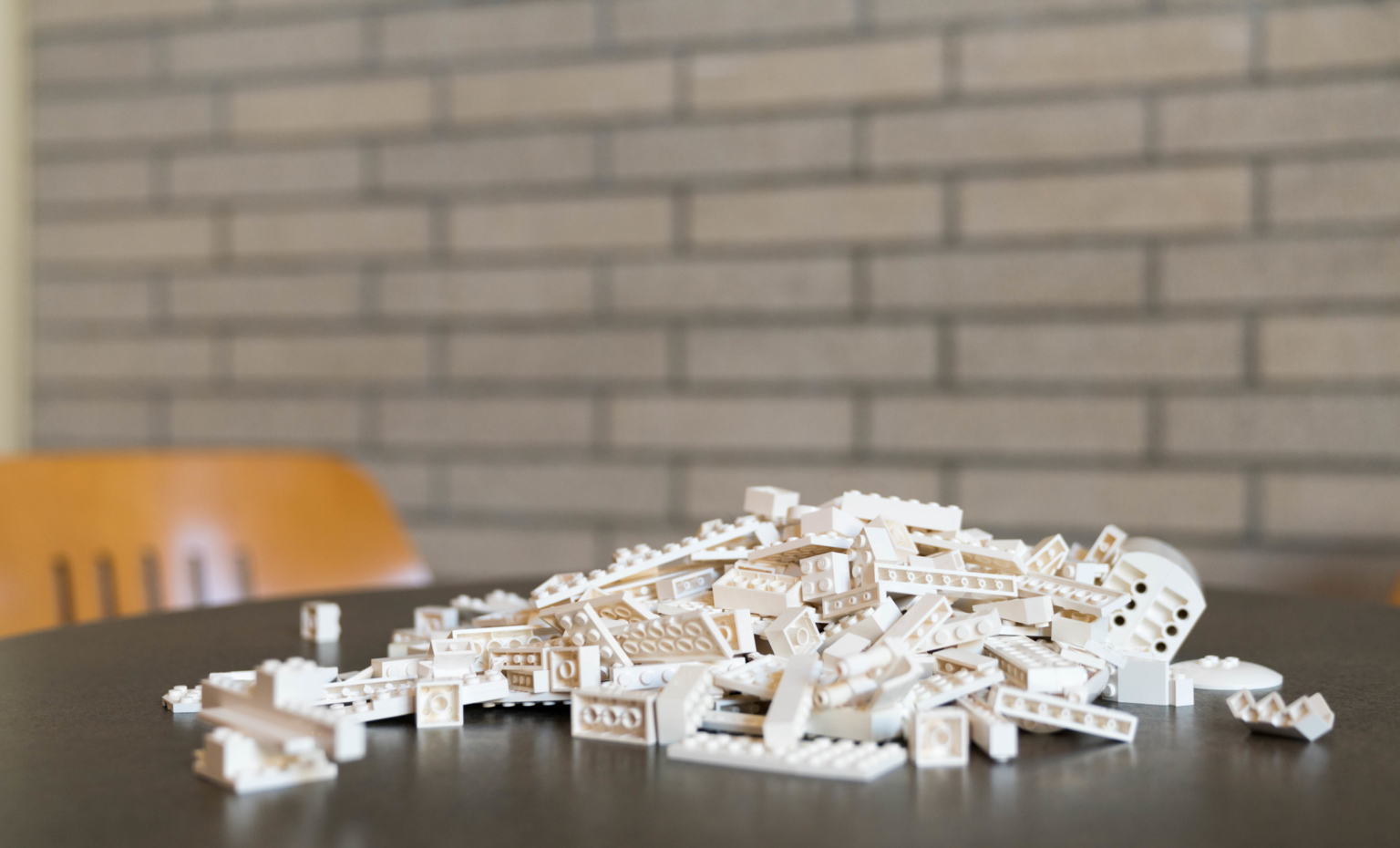 a pile of white legos on a table a pile of white legos on a table