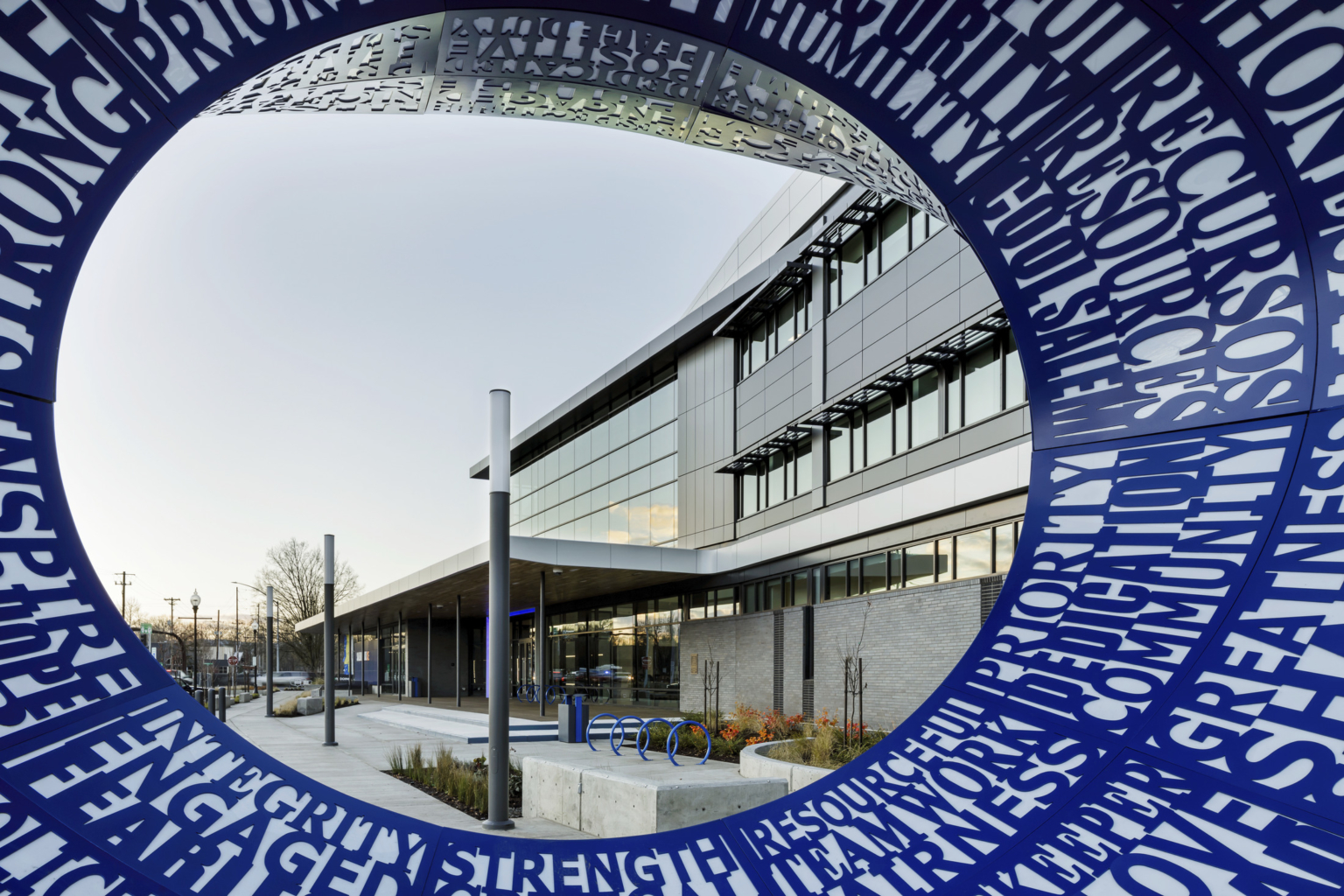 perspective through an outdoor sculpture at the salem police station