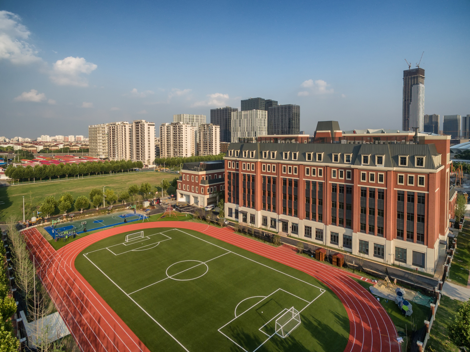 Athletics field with running track at Huili International School
