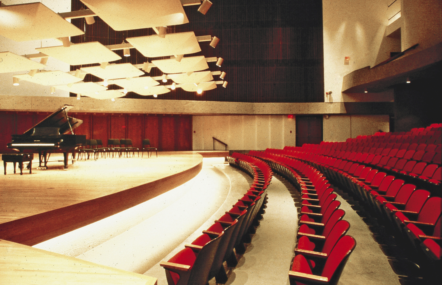 theater from the 1970s with red seating theater from the 1970s with red seating