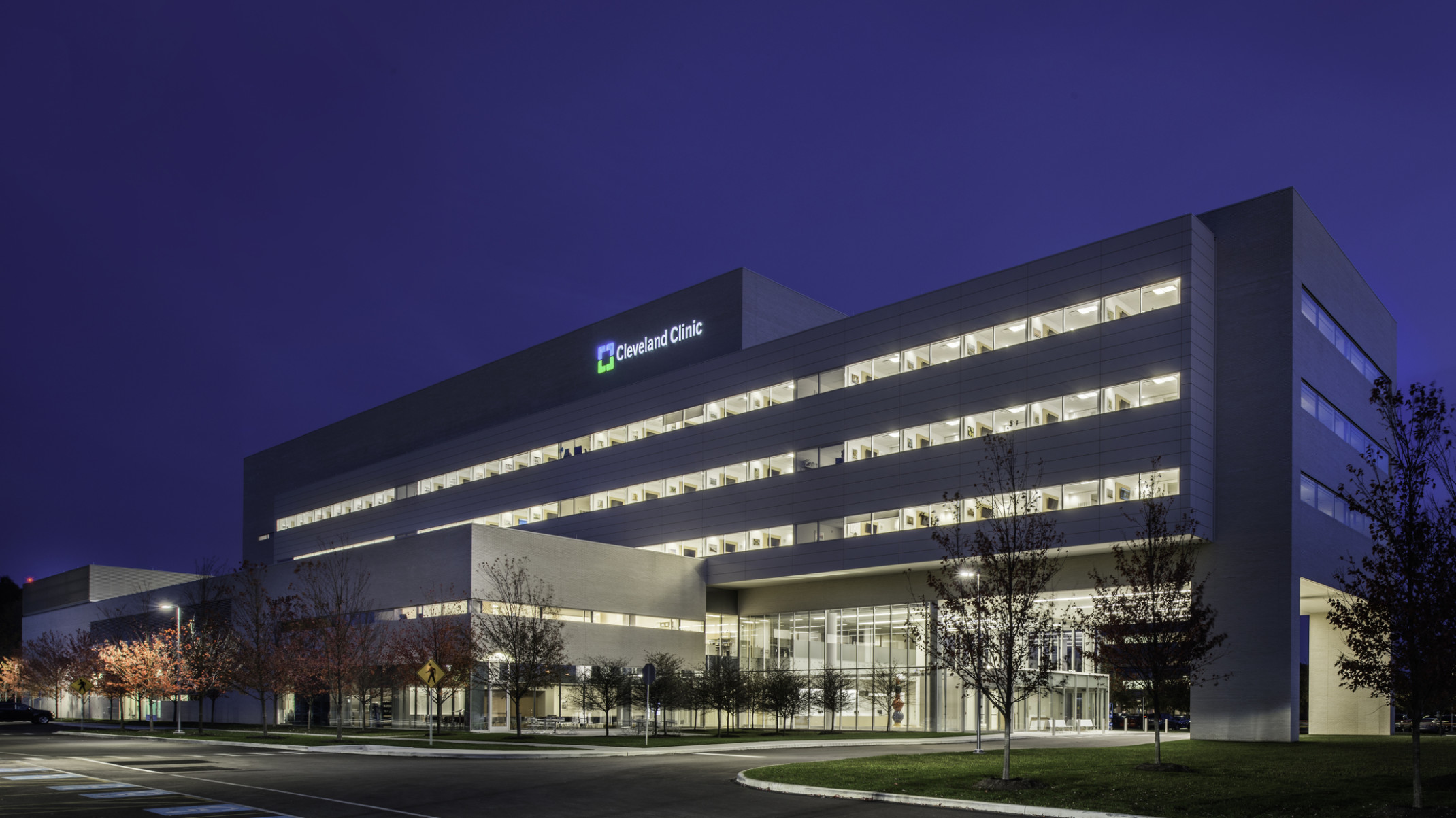 an illuminated hospital against a dark sky an illuminated hospital against a dark sky
