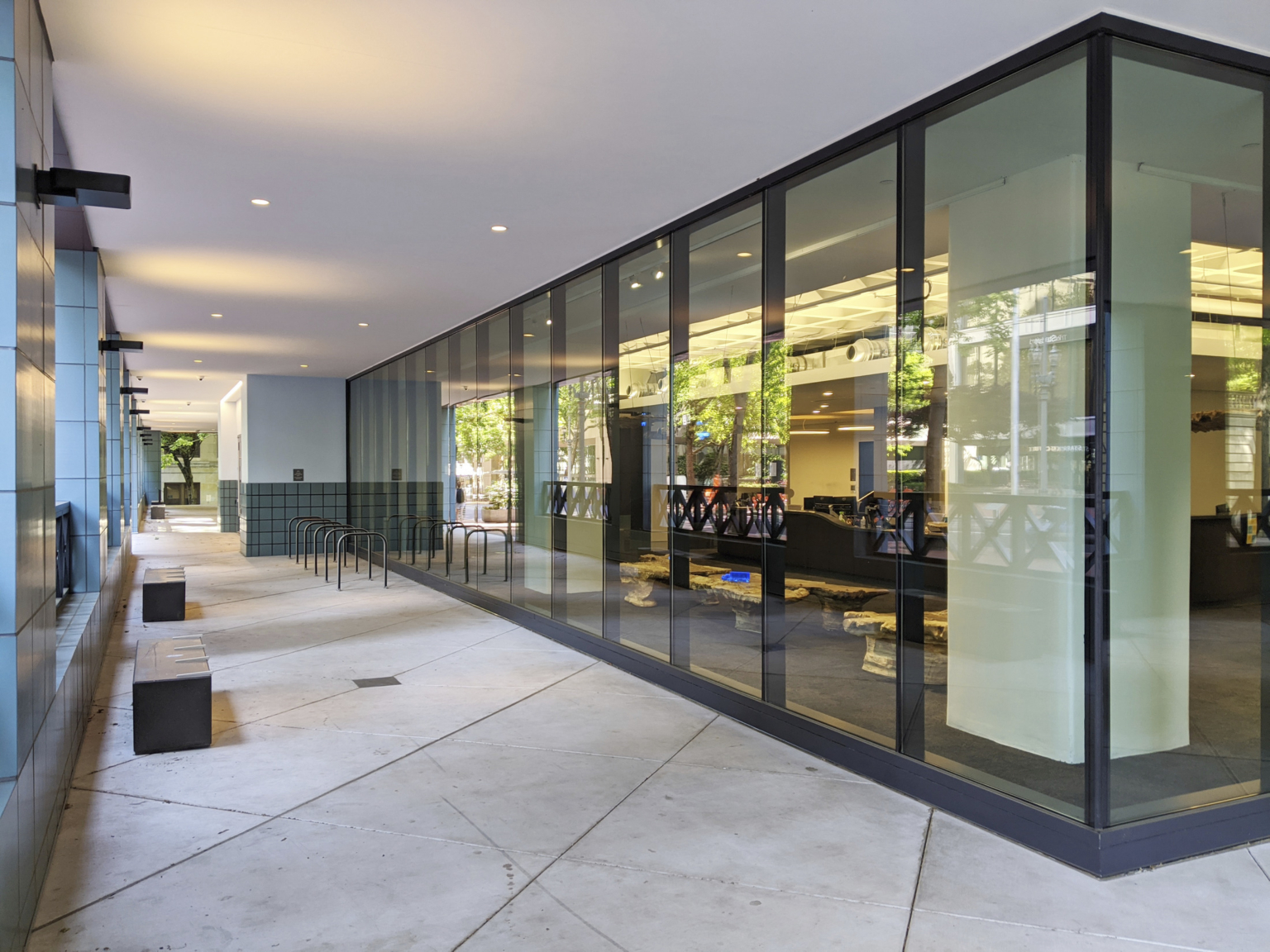 The base of the building with views into customer service areas The base of the building with views into customer service areas