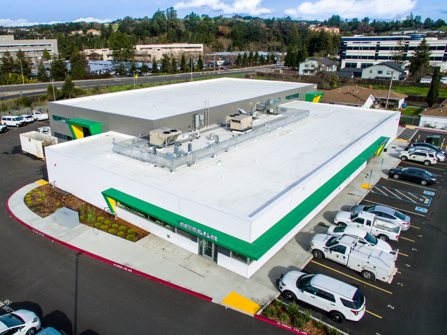 aerial view of lab building with surrounding parking lot