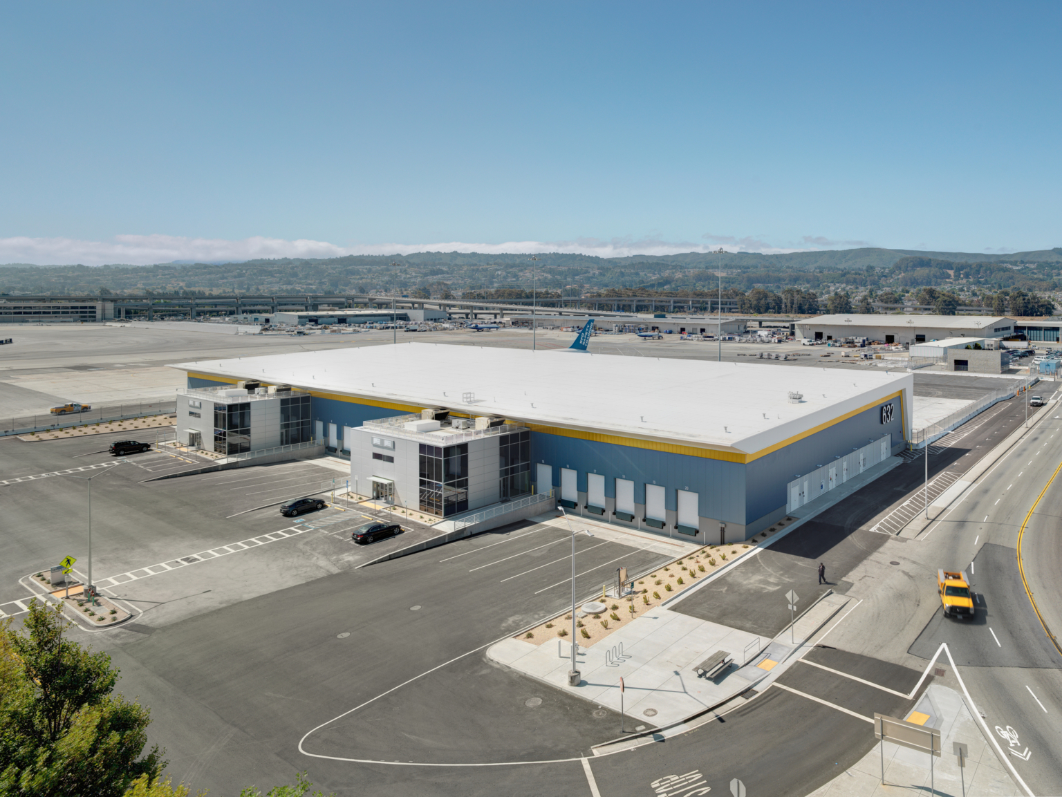 aerial shot of cargo building with empty surrounding lot