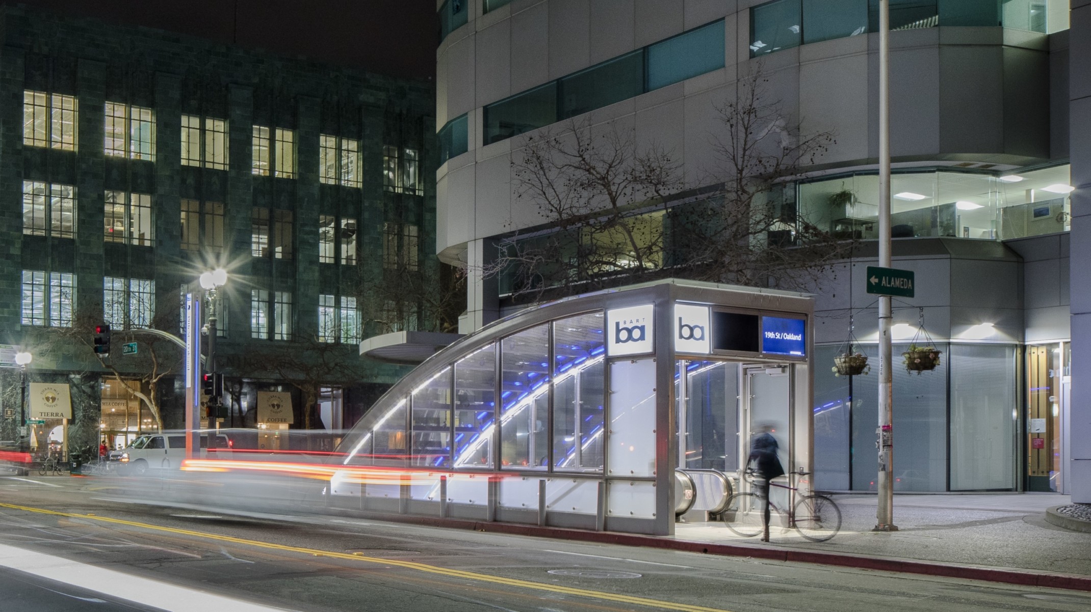 night view of city street level entrance to underground subway station night view of city street level entrance to underground subway station