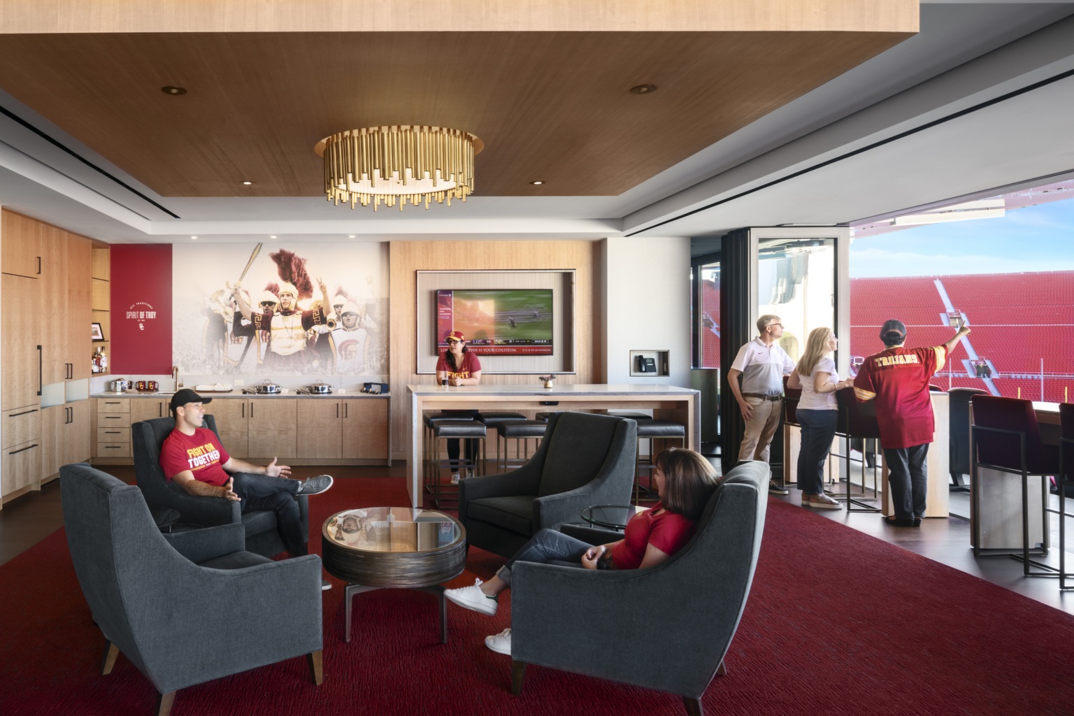 a private suite with a kitchen and operable wall at the USC LA Memorial Coliseum