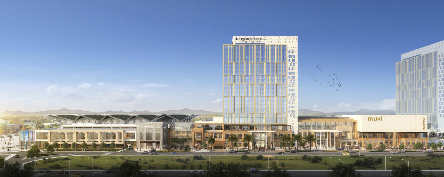 Aerial view of mixed-use development design in day time. Aerial view of mixed-use development design in day time.