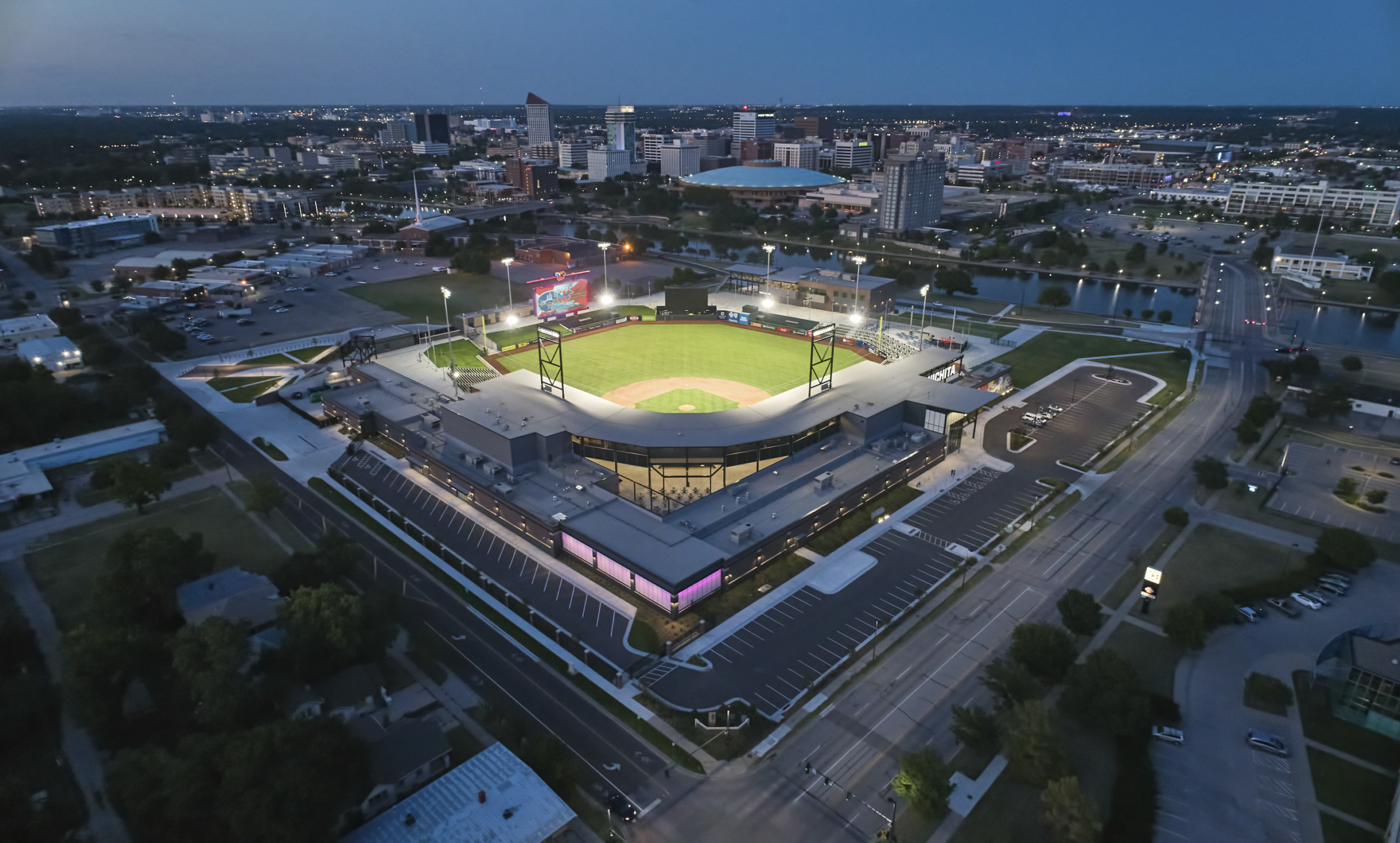 Riverfront baseball stadium illuminated at night in downtown Wichita Kansas Riverfront baseball stadium illuminated at night in downtown Wichita Kansas