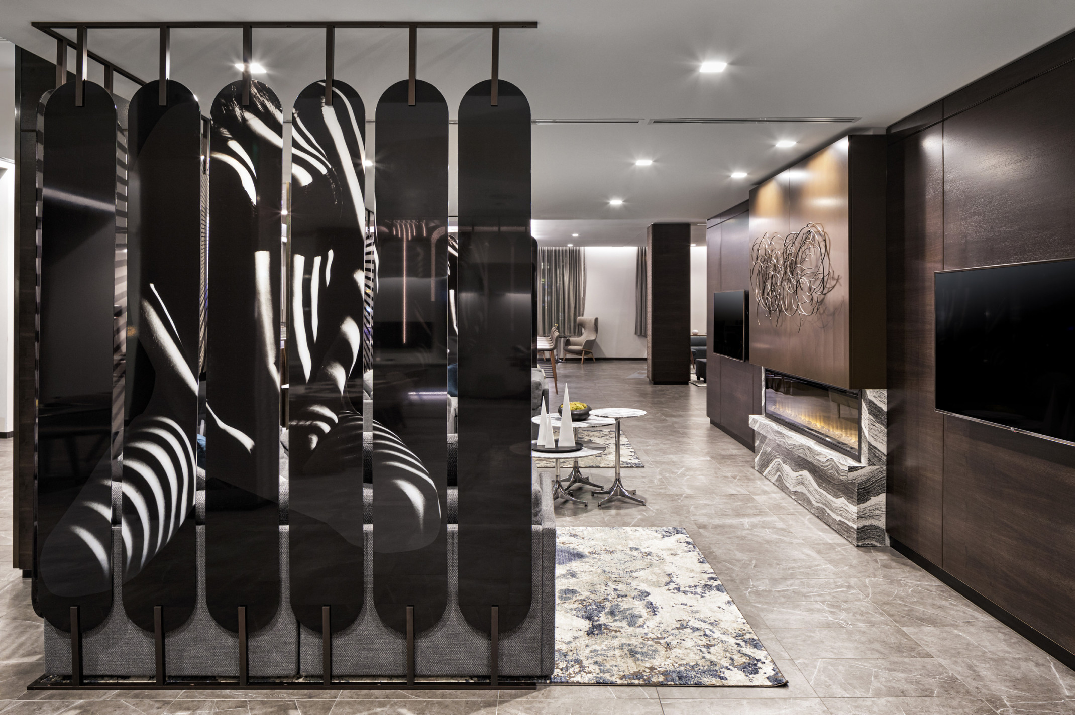 sculptural space divider in a monochromatic hotel lobby with wood paneled walls sculptural space divider in a monochromatic hotel lobby with wood paneled walls