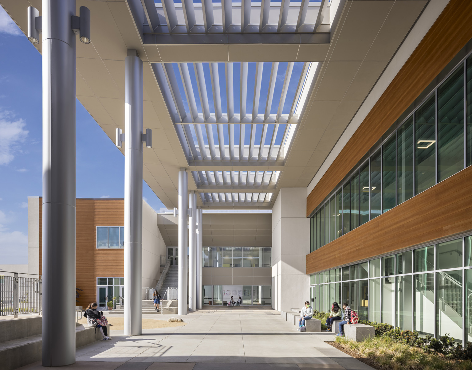 louvered canopy shades a building perimeter walkway louvered canopy shades a building perimeter walkway